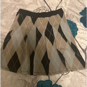 Skirt and crop top from almost famous.Medium, grey brown black pattern